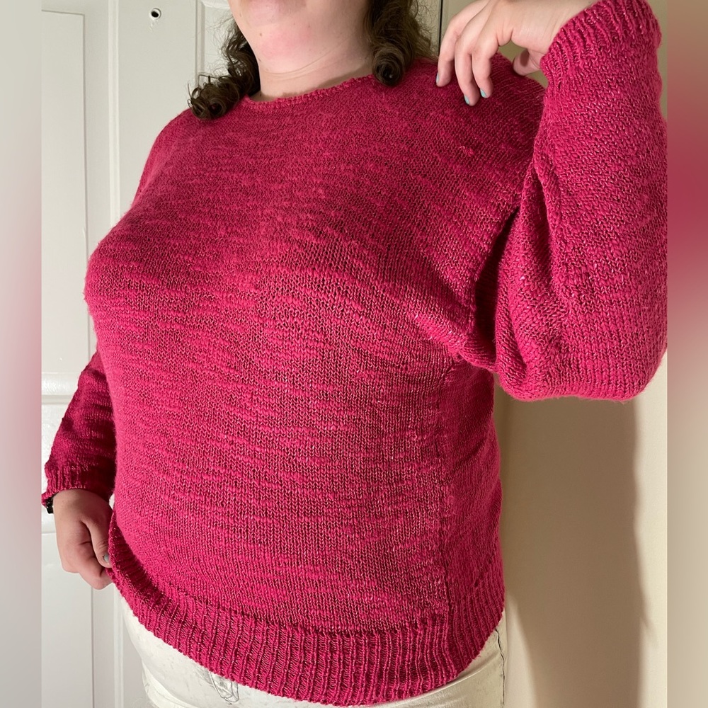 A soft, bright pink fall/winter sweater. Very light and comfy.